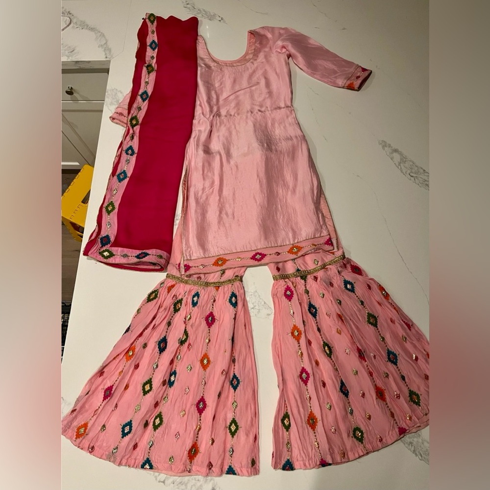 Pink and fuchsia sharara suit with traditional embroidery